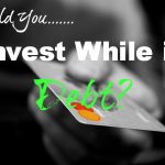 should you invest while in debt
