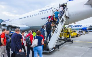 passengers boarding a reliable Lufthansa plane