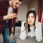 A man berating his girlfriend