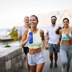 Millennials running outside together