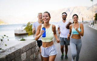 Millennials running outside together