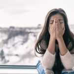 A woman looking overwhelemed