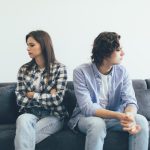 A couple looking away from one another