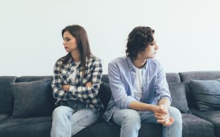 A couple looking away from one another