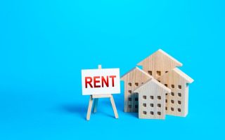 Model house with a for rent sign