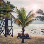 Color toned picture of an empty tropical beach, travel concept,