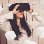 A woman wearing a VR headset