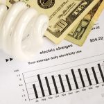 a pile of bills on an electric bill