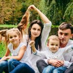 happy family with husband, wife, son, and daughter