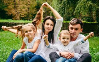 happy family with husband, wife, son, and daughter