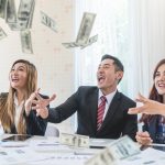 bussiness people throwing money in the air
