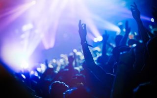 A bunch of people at a club, enjoying the nightlife