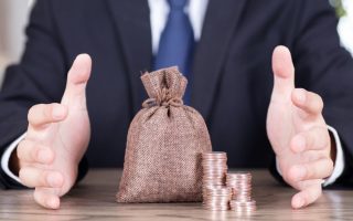 A man with coins after a bad investment