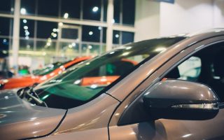 A car windshield, which often holds flyers left by criminals