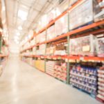 Blurry Costco store with full shelves of products
