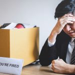 A stressed man fired from his job