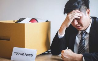 A stressed man fired from his job