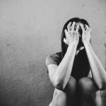 A woman who is battling with negative self-talk