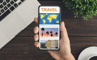 Woman using smartphone with travel app