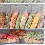 Plastic bags with food in a freezer