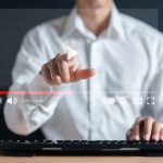 Man watching a video on a website