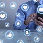 A person on their smartphone using social media and making parasocial relationships