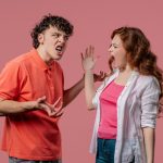 Adult siblings aruging with each other