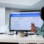 A woman being graded during an employee review