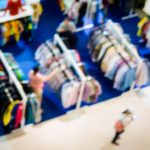 A blurred picture of a clothing store