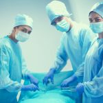 Team surgeon at work in operating room