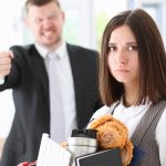 Angry yelling boss pointing at employees as they to exit