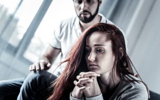 Frustrated couple looking away from each other