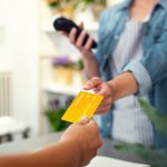 Someone paying their rent with a credit card, which is a financial hack that feels illegal but isn't