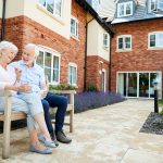 A pair of older people living in assisted living