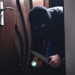 A burglar breaking into a house that wasn't properly guarded
