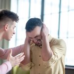 A couple of men aruging in public