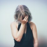 A woman being sad and emotionally immature