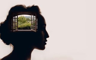 The profile of a woman attempting to protect her mental health