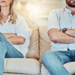 Two people distancing themselves from one another
