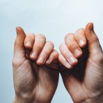 Someone cracking their knuckles, which is a habit that was discredited years ago