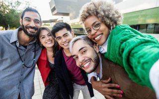 A group of millennials hanging out together