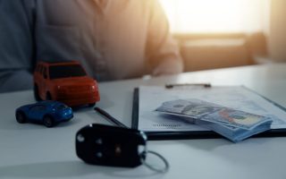 A car payment, which is something that rich people don't have to pay for