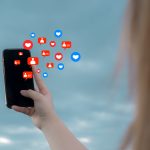 A woman spending too much time using social media on her phone