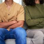 A couple experiencing emotional distance because of bad social habits