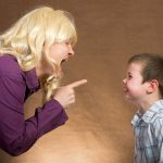 A mother yelling at her son in anger