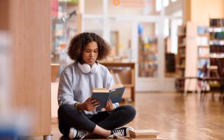 A student attempting to read at an education center
