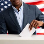 Someone voting after being influenced by political ads