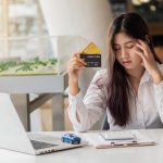 A woman attempting to practice healthy finance habits