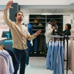 A retail employee at work, where he must keep secrets for his employer.
