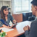 A man sitting down for a job interview